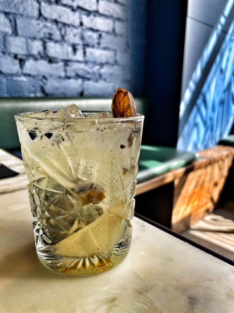 The Que Club's caiprinha da primavera is a drink made of cachaca and popular in Brazil. The Que Club's version is not as sweet as it has negroni marmalade and jalapenos.